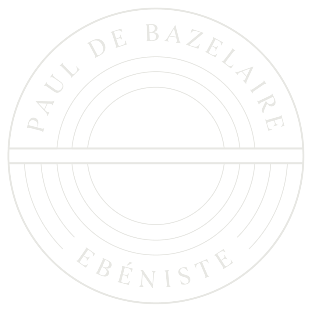 Logo de l'Atelier Paul de Bazelaire - Ébéniste d'art à Lyon, spécialiste des meubles et agencement sur mesure en bois massif